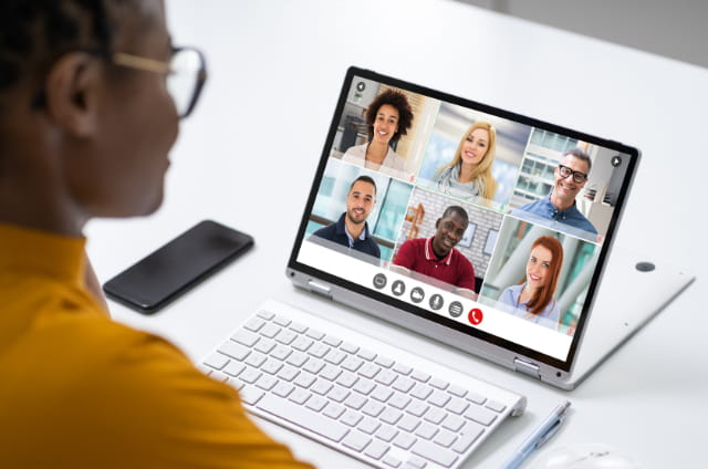 Person learning how to improve their digital body language on a zoom call