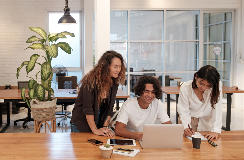 Three people showing the value of neurodiversity in the workplace