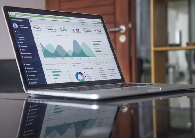 Laptop with statistics showing why data visualisation is important for your organisation