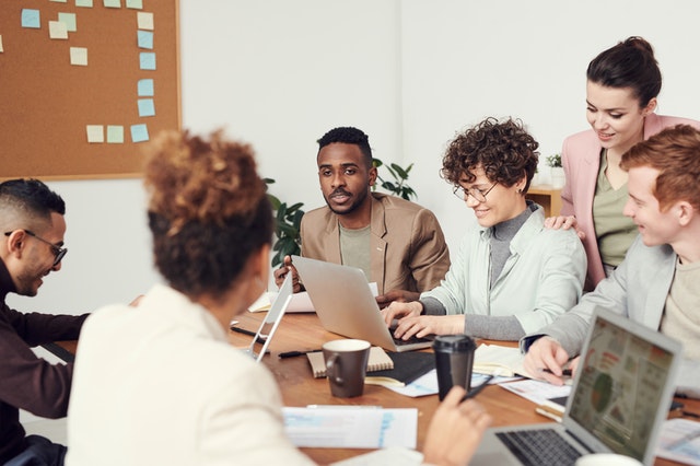 Group of employees taking part in in-house training from UMG