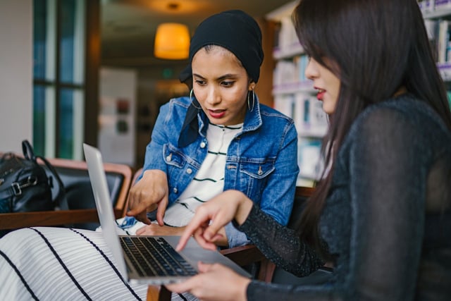 Two employees learning essential soft skills for success in the public sector