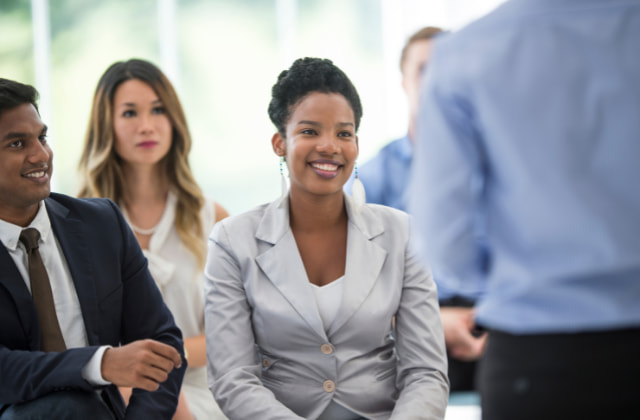 Employees learning why an account manager can fulfil public sector training needs