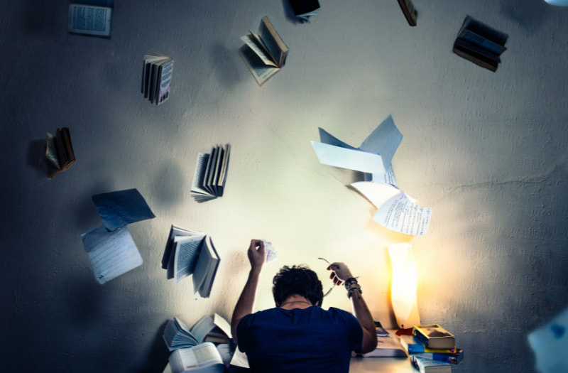 Person with paper learning how to be resilient at work with tips and strategies