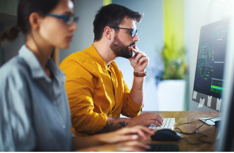 Two people learning about the importance of employee training